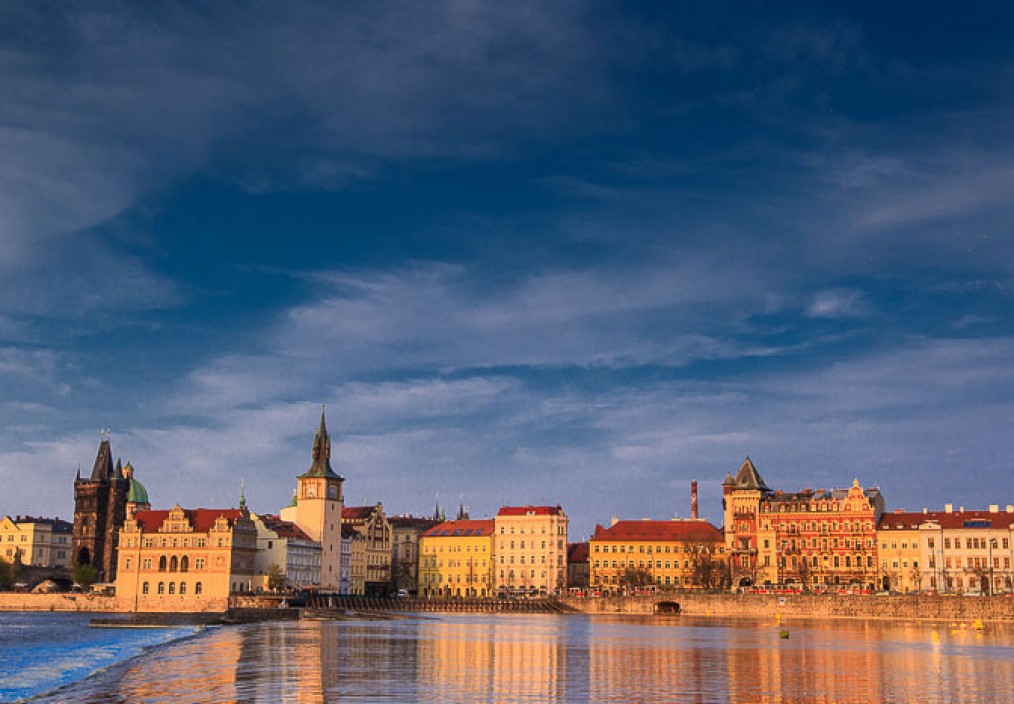 A view of Prague from the Vltava river at golden hour