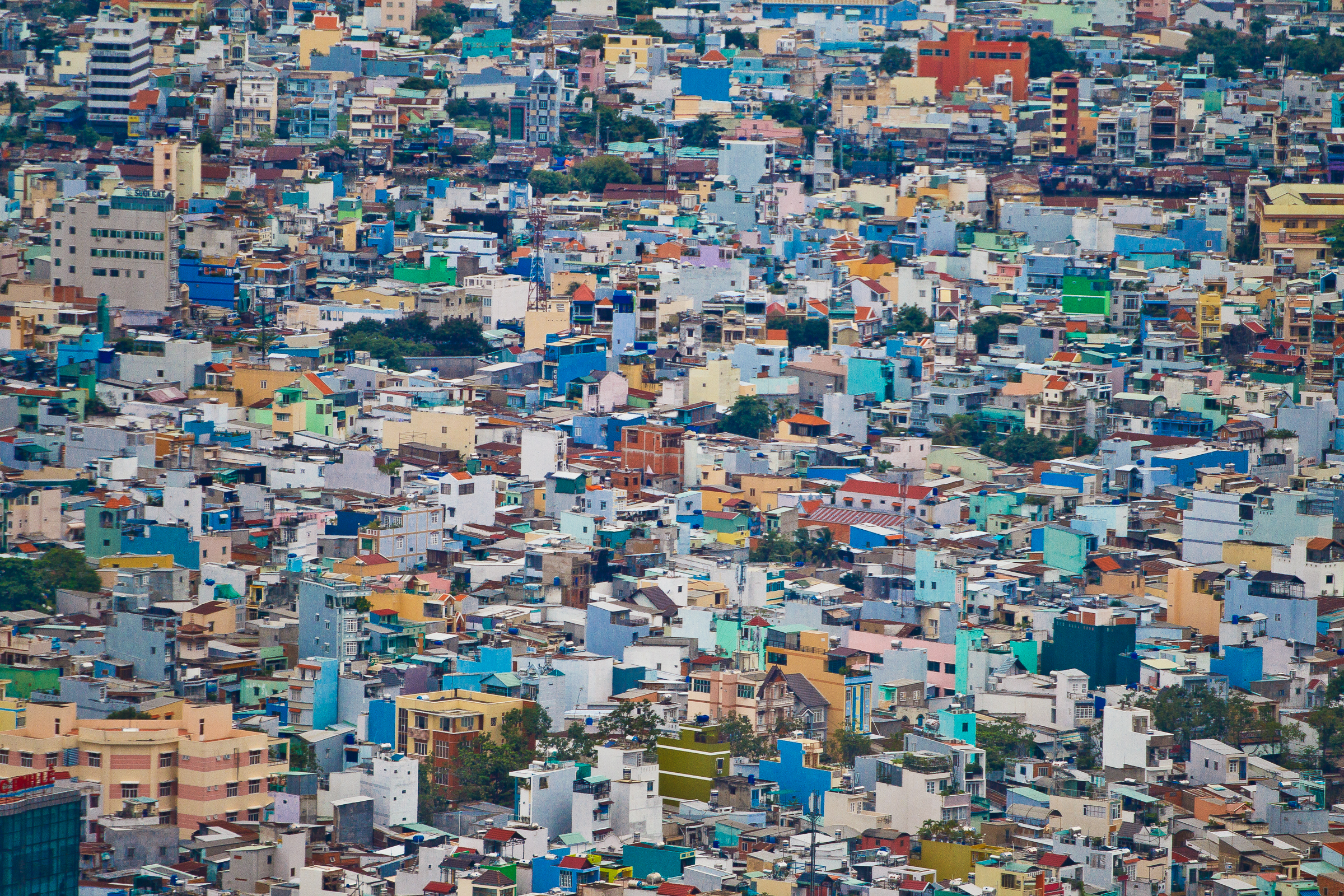 Colourful buildings are packed tightly together in Ho Chi Minh City, Vietnam.