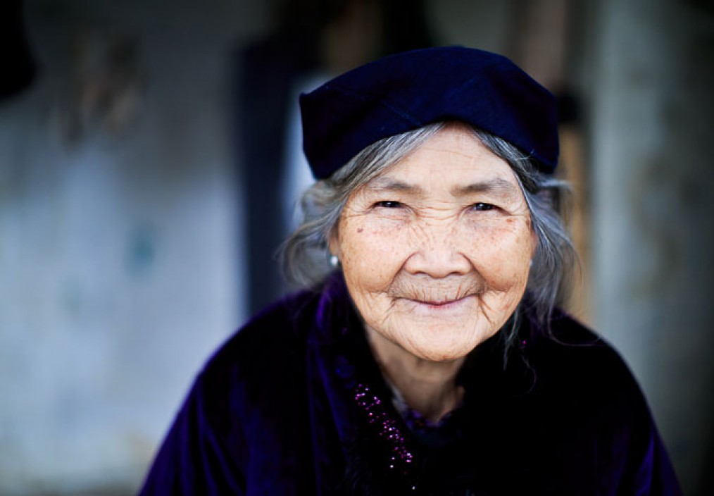 A Vietnames Tay woman smiles for the camera